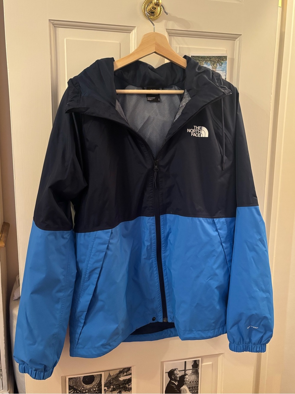 TWO TONED BLUE NORTH FACE WIND BREAKER